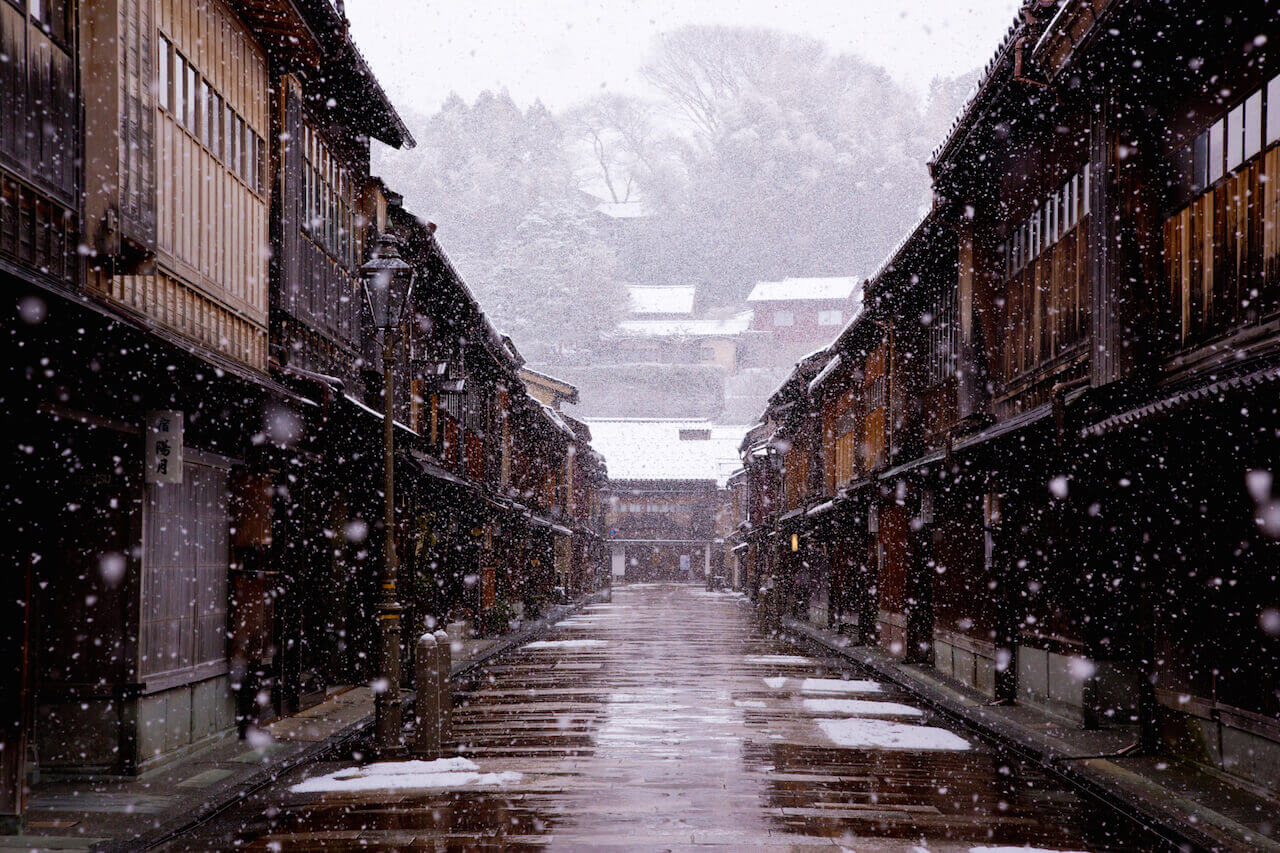 Quiet tea house street in snow-covered Kenrokuen Garden, Kanazawa